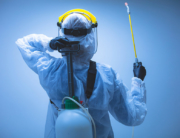 Coronavirus cleaner wearing PPE