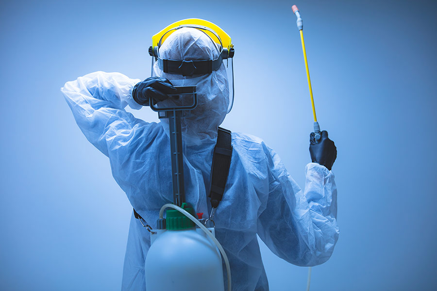 Coronavirus cleaner wearing PPE